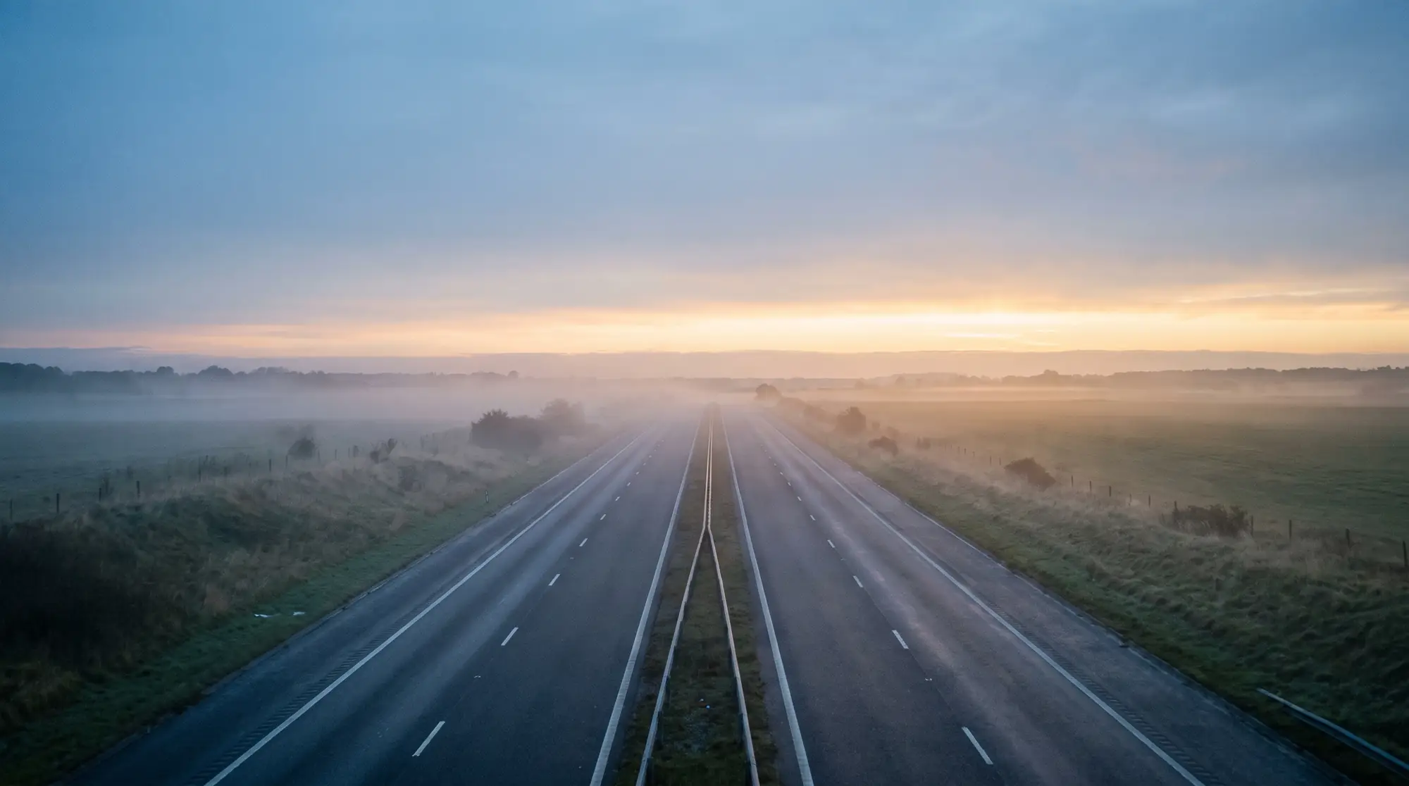 An empty dual carriageway heading south from Grantham at dawn